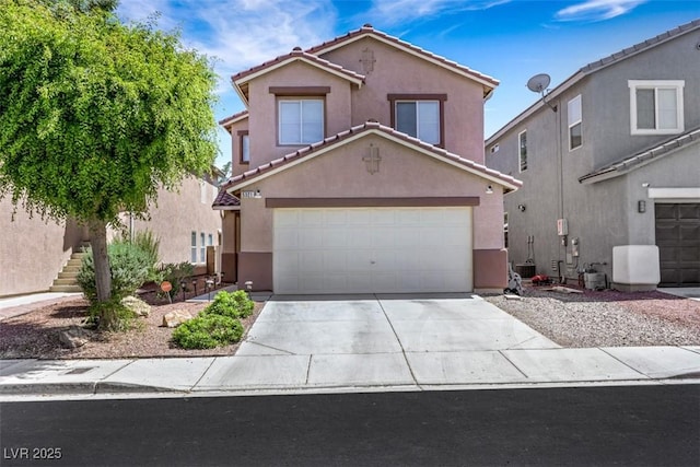 5321 Welch Valley Ave, Las Vegas, NV 89131 - mediterranean / spanish house featuring a tiled roof, stucco siding, and concrete driveway