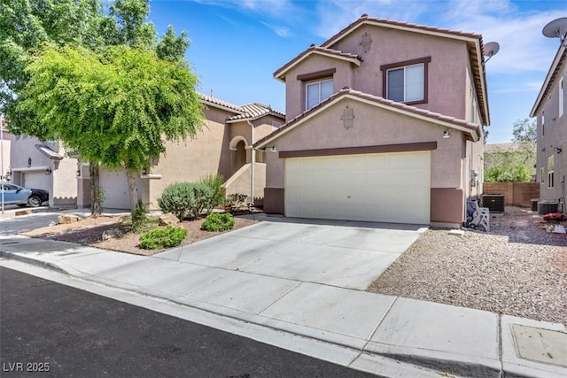 5321 Welch Valley Ave, Las Vegas, NV 89131 - view of front of house with stucco siding, a tile roof, concrete driveway, and cooling unit