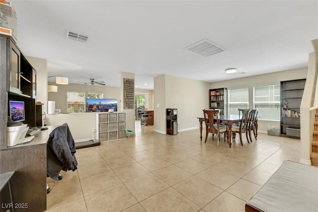 5321 Welch Valley Ave, Las Vegas, NV 89131 - dining space with light tile patterned floors, baseboards, and healthy amount of natural light