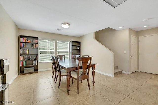 5321 Welch Valley Ave, Las Vegas, NV 89131 - dining space with stairway, light tile patterned floors, baseboards, and recessed lighting
