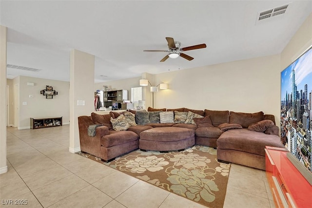 5321 Welch Valley Ave, Las Vegas, NV 89131 - living area featuring light tile patterned floors and a ceiling fan