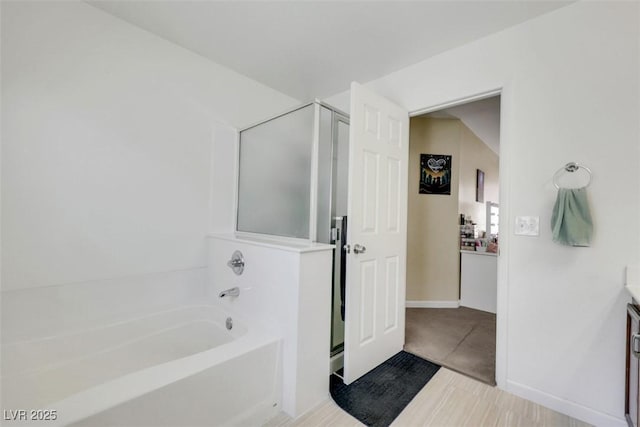 5321 Welch Valley Ave, Las Vegas, NV 89131 - full bath featuring a bath, vanity, and a shower stall