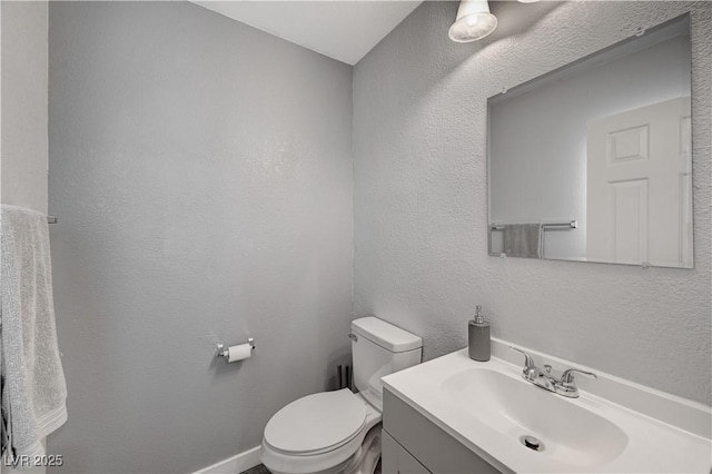 687 Porchtown Ave, Las Vegas, NV 89183 - half bathroom featuring toilet, vanity, and a textured wall