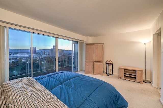 3111 Bel Air Dr Unit 23A, Las Vegas, NV 89109 - bedroom with light carpet and baseboards