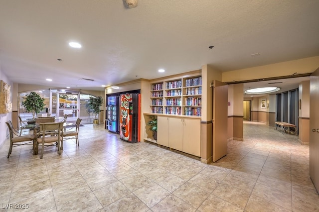 3111 Bel Air Dr Unit 23A, Las Vegas, NV 89109 - dining space featuring recessed lighting and light tile patterned flooring