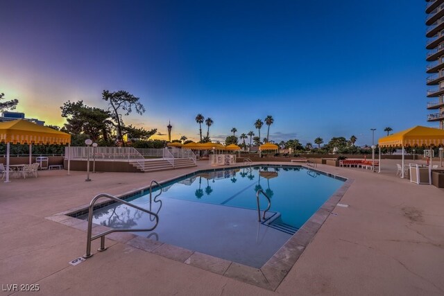 3111 Bel Air Dr Unit 23A, Las Vegas, NV 89109 - community pool with a patio area