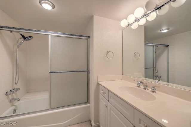3111 Bel Air Dr Unit 23A, Las Vegas, NV 89109 - bathroom featuring vanity and combined bath / shower with glass door