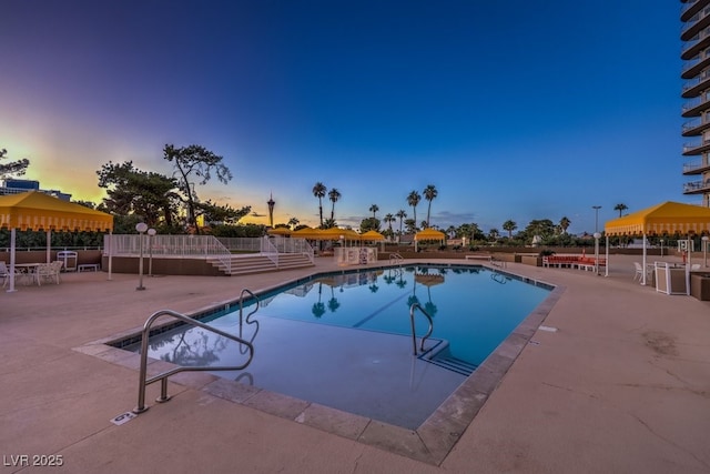 3111 Bel Air Dr Unit 23A, Las Vegas, NV 89109 - community pool with a patio area