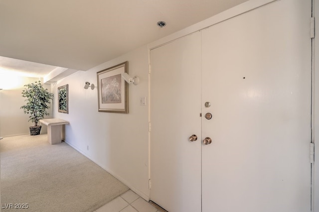 3111 Bel Air Dr Unit 23A, Las Vegas, NV 89109 - corridor featuring light carpet and baseboards
