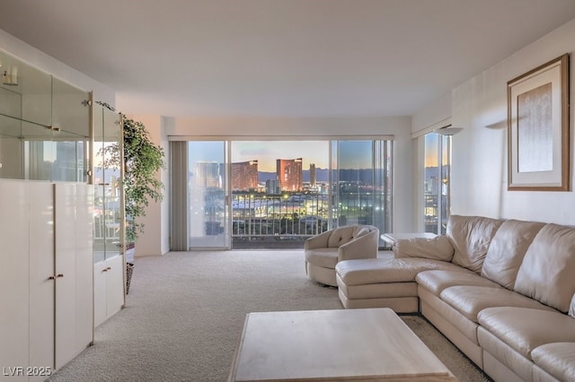 3111 Bel Air Dr Unit 23A, Las Vegas, NV 89109 - carpeted living area featuring a city view