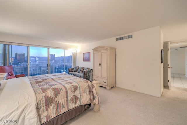 3111 Bel Air Dr Unit 23A, Las Vegas, NV 89109 - bedroom featuring light colored carpet