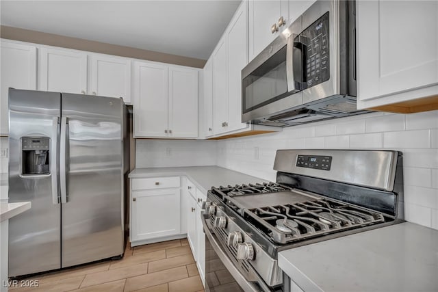 688 Monroe Hill Pl, Henderson, NV 89011 - kitchen with appliances with stainless steel finishes, light countertops, and white cabinetry