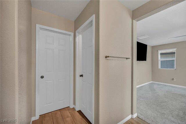 688 Monroe Hill Pl, Henderson, NV 89011 - hallway with baseboards and light wood-style floors