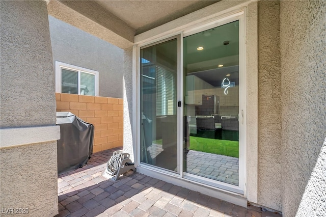 688 Monroe Hill Pl, Henderson, NV 89011 - doorway to property featuring stucco siding