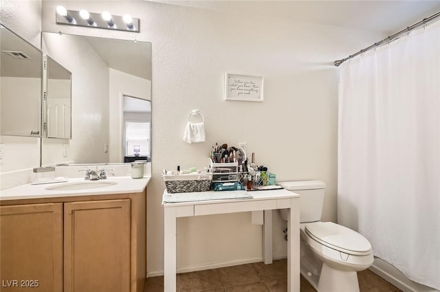 8252 Pearl Oasis Ct, Las Vegas, NV 89139 - bathroom featuring toilet, vanity, tile patterned floors, and curtained shower