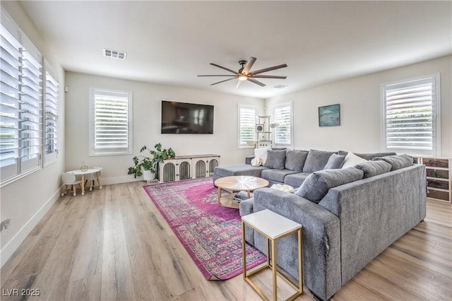 9655 Skye Star Ave, Las Vegas, NV 89166 - living area with ceiling fan, wood finished floors, and baseboards
