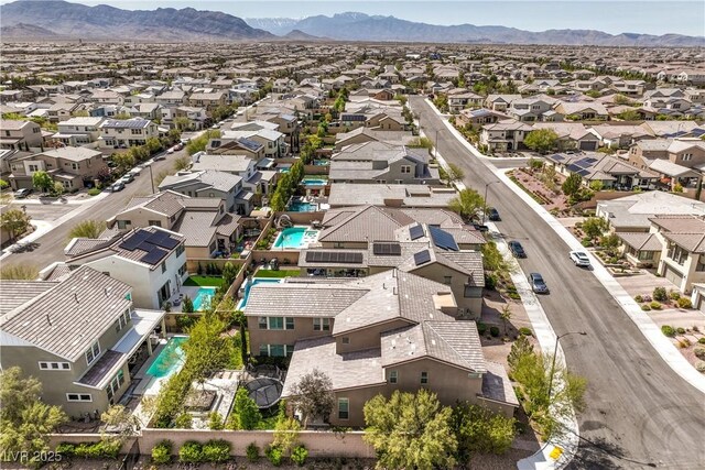 9655 Skye Star Ave, Las Vegas, NV 89166 - aerial view of residential area with a pool area and mountains