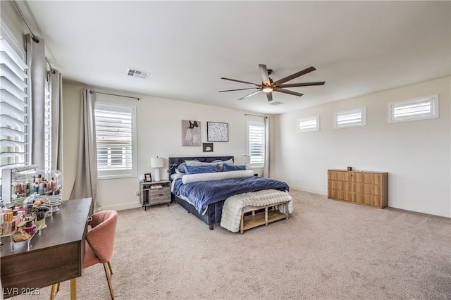 9655 Skye Star Ave, Las Vegas, NV 89166 - bedroom with light carpet, baseboards, and ceiling fan