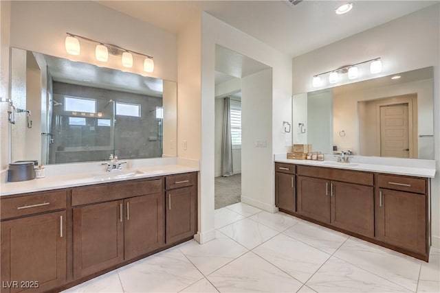 9655 Skye Star Ave, Las Vegas, NV 89166 - bathroom featuring a stall shower, two vanities, marble look tile flooring, baseboards, and recessed lighting