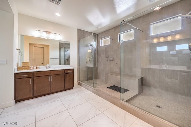 9655 Skye Star Ave, Las Vegas, NV 89166 - full bathroom with a stall shower, vanity, marble look tile flooring, and recessed lighting