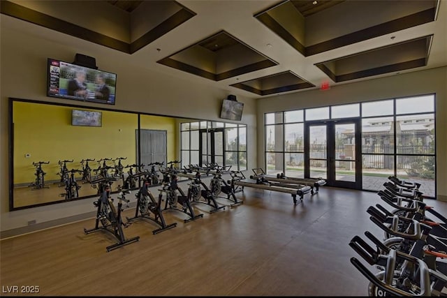 9655 Skye Star Ave, Las Vegas, NV 89166 - gym featuring french doors, a high ceiling, coffered ceiling, beam ceiling, and baseboards