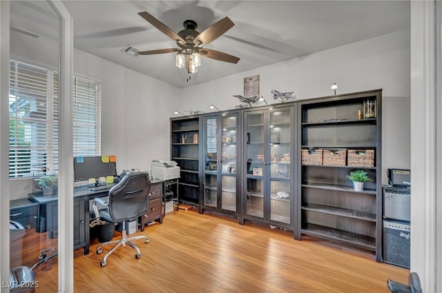 10213 Treasure Mountain Ct, Las Vegas, NV 89129 - office area featuring ceiling fan and wood finished floors