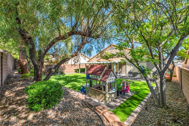 10213 Treasure Mountain Ct, Las Vegas, NV 89129 - view of yard with a deck