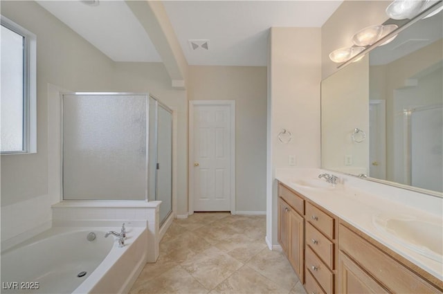 11441 Drappo Ave, Las Vegas, NV 89138 - full bath with double vanity, a stall shower, and a garden tub