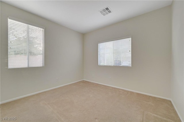 11441 Drappo Ave, Las Vegas, NV 89138 - spare room featuring light carpet and baseboards