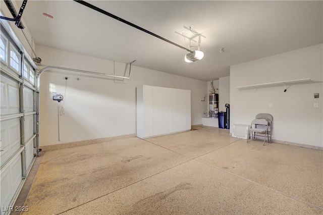 11441 Drappo Ave, Las Vegas, NV 89138 - garage featuring strapped water heater, a garage door opener, and baseboards