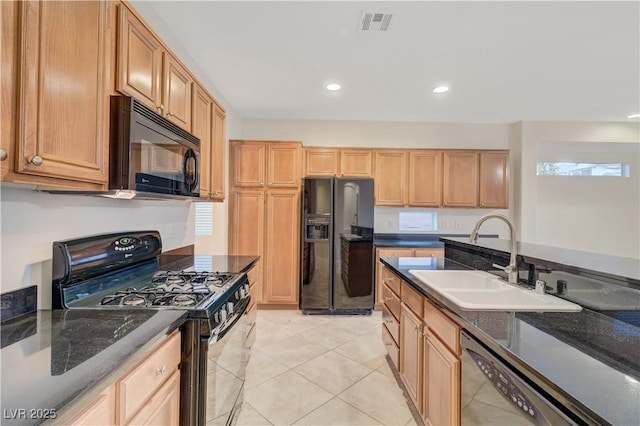 11441 Drappo Ave, Las Vegas, NV 89138 - kitchen with black appliances, a sink, light tile patterned flooring, recessed lighting, and dark stone counters