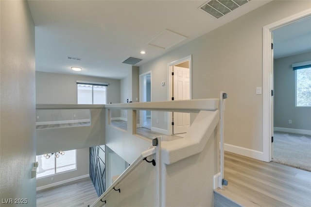 10908 Royal Highlands St, Las Vegas, NV 89141 - staircase with baseboards, wood finished floors, recessed lighting, and attic access