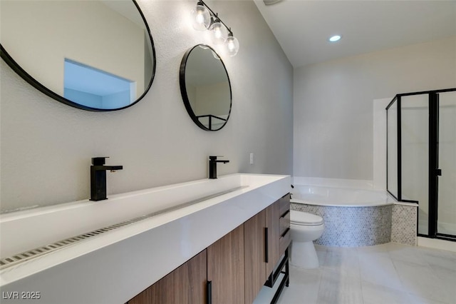 10908 Royal Highlands St, Las Vegas, NV 89141 - full bath featuring toilet, a garden tub, a stall shower, double vanity, and tile patterned floors