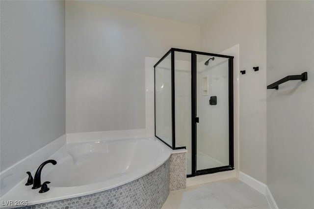 10908 Royal Highlands St, Las Vegas, NV 89141 - full bathroom with a shower stall, a bath, and tile patterned floors