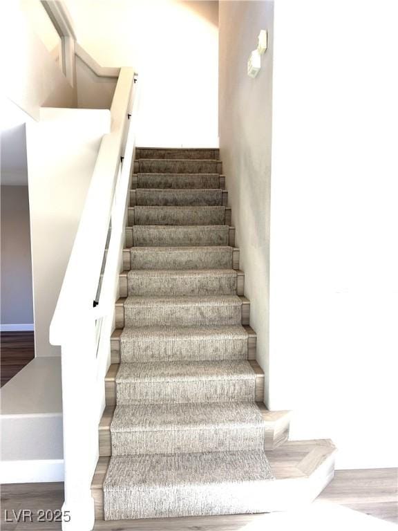 10908 Royal Highlands St, Las Vegas, NV 89141 - staircase with wood finished floors