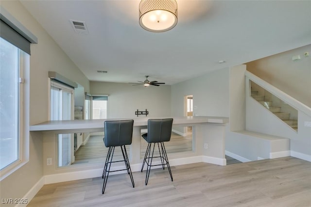 10908 Royal Highlands St, Las Vegas, NV 89141 - kitchen featuring wood finished floors, baseboards, and ceiling fan