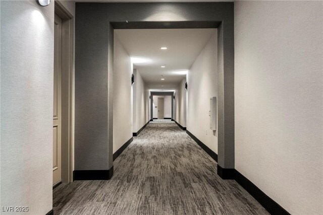 68 E Serene Ave Unit 224, Las Vegas, NV 89123 - hall with baseboards, dark wood finished floors, and recessed lighting