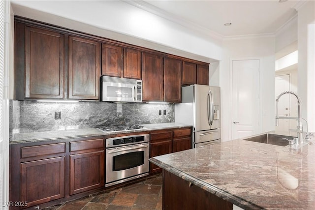 68 E Serene Ave Unit 224, Las Vegas, NV 89123 - kitchen featuring stainless steel appliances, a sink, crown molding, stone counters, and tasteful backsplash