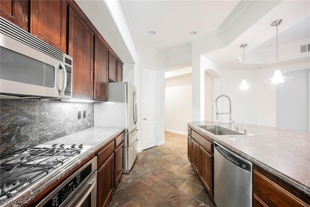 68 E Serene Ave Unit 224, Las Vegas, NV 89123 - kitchen with appliances with stainless steel finishes, a sink, ornamental molding, stone tile floors, and decorative backsplash
