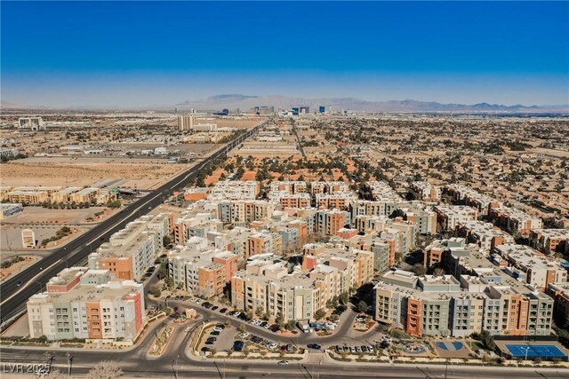 68 E Serene Ave Unit 224, Las Vegas, NV 89123 - aerial overview of property's location with a mountainous background and nearby urban area