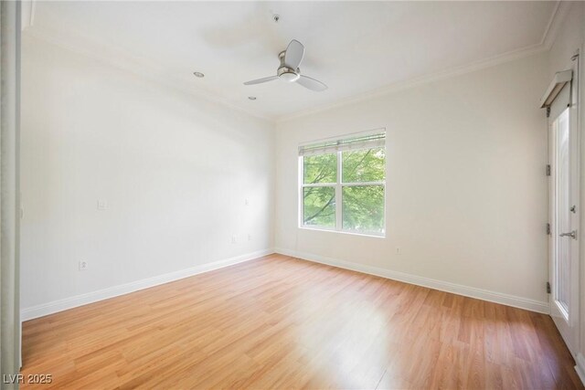 68 E Serene Ave Unit 224, Las Vegas, NV 89123 - spare room featuring light wood-style floors, baseboards, ornamental molding, and a ceiling fan