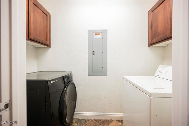 68 E Serene Ave Unit 224, Las Vegas, NV 89123 - laundry area with electric panel, cabinet space, washing machine and dryer, baseboards, and stone finish flooring