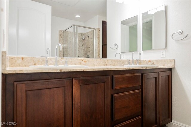 68 E Serene Ave Unit 224, Las Vegas, NV 89123 - bathroom with a stall shower and double vanity