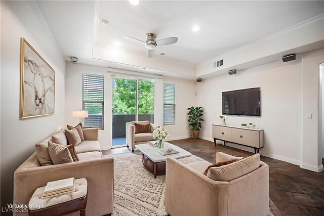 68 E Serene Ave Unit 224, Las Vegas, NV 89123 - living area with a ceiling fan, a raised ceiling, ornamental molding, baseboards, and stone finish floors