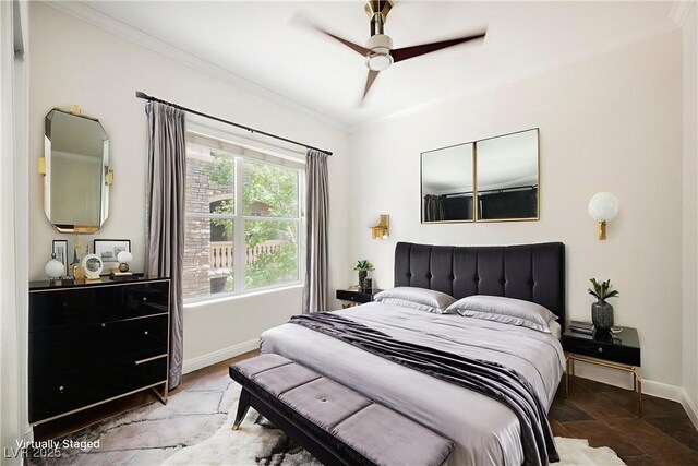 68 E Serene Ave Unit 224, Las Vegas, NV 89123 - bedroom with crown molding, baseboards, and a ceiling fan