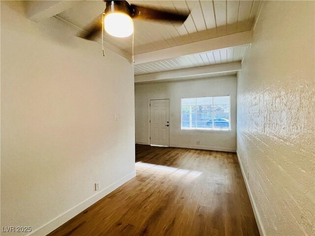 700 N Minnesota St, Las Vegas, NV 89107 - empty room featuring beam ceiling, wood finished floors, ceiling fan, and baseboards