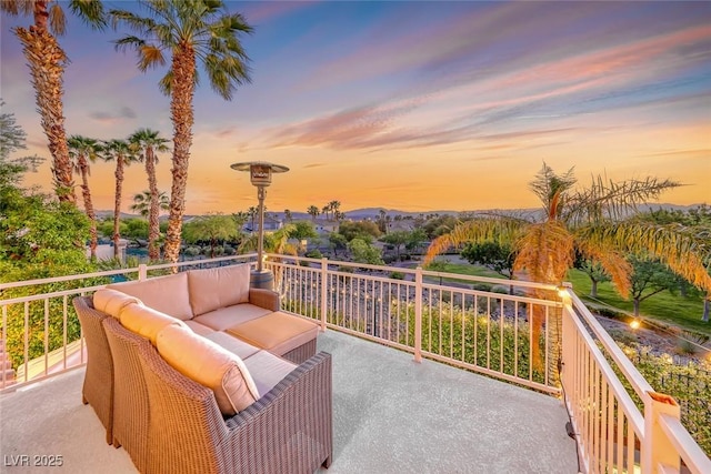 3050 Whispering Crest Dr, Henderson, NV 89052 - patio terrace at dusk with an outdoor living space and a balcony