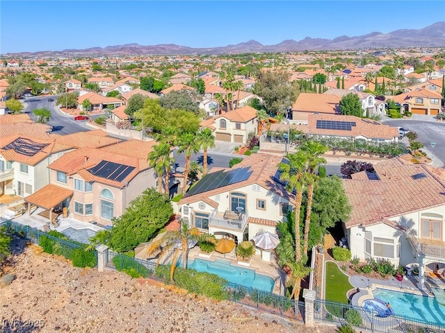 3050 Whispering Crest Dr, Henderson, NV 89052 - aerial perspective of suburban area featuring a pool area and a mountainous background