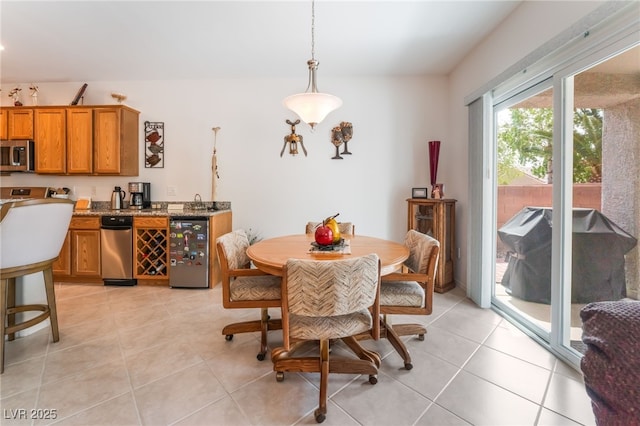 2413 Mourning Warbler Ave, North Las Vegas, NV 89084 - dining space featuring light tile patterned floors
