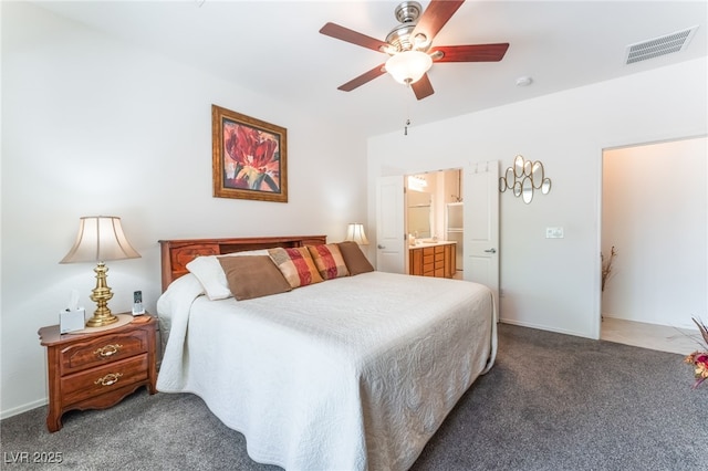 2413 Mourning Warbler Ave, North Las Vegas, NV 89084 - bedroom with carpet floors, ensuite bath, and ceiling fan